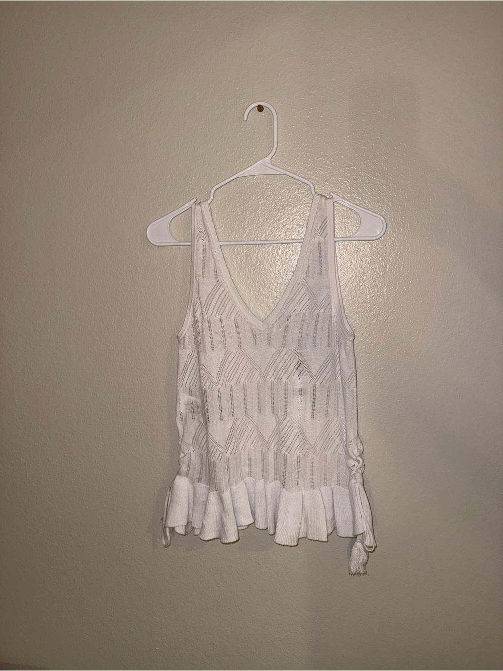 BCBGeneration White Knit V-Neck Tank with Ruffle Hem and Tassel Ties